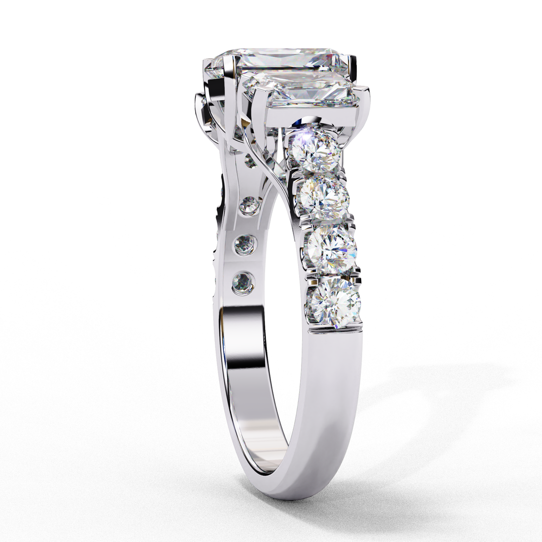 Treble Emerald Diamond Ring